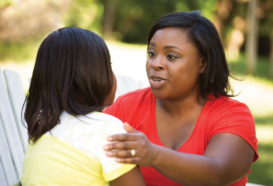 mom helping daughter