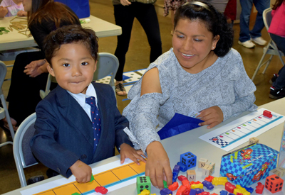 Boy and his mom playing a game